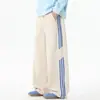 NASA SOBRE Calça esportiva masculina moderna estilo americano, corte solto, perna reta, design de retalhos listrados, calça comprida casual versátil para outono e primavera