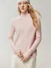 Suéter de estilo minimalista 100% cachemira pura para mujer, con cuello alto, mangas largas, un diseño ligero y elegante, perfecto para usar en capas y mantenerse abrigada.