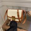 Bolso de diseño de nicho de alta gama para mujer, nuevo bolso bandolera de hombro a juego de moda de 2024, bolso cuadrado pequeño con textura.