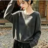 Top de punto con lentejuelas huecas y cuello en V para mujer, manga larga, nuevo de otoño 2026, estilo perezoso holgado, suéter top con sentido del diseño