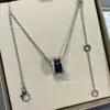 Collar de Cerámica Blanco y Negro Versión Alta V Dorada Cadena de Clavícula Pequeño Hombre Rojo Caridad Cadena Gruesa Chapada en Oro de 18K