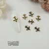Ventas Directas de Fábrica de Nuevos Pedrería Retro Cruzada para Uñas de Moda al Por Mayor, Decoraciones para Uñas con Forma de Corazón y Cabeza de León
