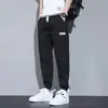 Calça Jeans Masculina Outono Nova Estilo Coreano Primavera Modelagem Solta Jogger Cargo com Apliques Moda Casual Tendência Comprimento Cropped