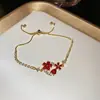Pulseira Geométrica Flor de Zircônia Verde Exquisita Estilo Francês, Sensação de Luxo Leve e Alto Padrão, Joia Personalizada Moderna e Elegante