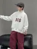 Moletom com Gola Alta para Meninos Estilo Primavera e Outono 2026 Novo Estilo Roupas Infantis Médias e Grandes Top de Manga Longa de Outono Roupas de Outono Menino Tendência Legal