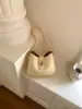 Bolso cruzado casual de diseño de nicho estilo coreano de alta gama para mujer, nuevo y elegante bolso de hombro para el trabajo de verano 2026 para mujer