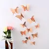 Pegatinas de pared de mariposa hueca de metal 3D tridimensional transfronterizas con adhesivo de doble cara, mariposas simuladas para decoración de sala de estar, dormitorio y fiesta