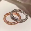 Versión de Gama Alta del Anillo Mobius Completo de Diamantes Gejia Anillo de Pareja Oro Rosa Lujo Accesible Moda Nicho Diseño de Anillo para Mujeres