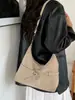 Tendência e versátil nova coleção de 2026 de bolsas de axila de nicho para mulheres, bolsas de ombro estilosas para mulheres, bolsas transversais de ombro de nicho para mulheres