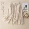 Saia midi rosa de renda doce em camadas estilo japonês, uma saia midi A-line de algodão e linho fluida e leve com cintura alta e barra evasê, perfeita para a primavera