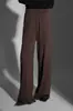 Chaleco de punto suelto adelgazante con cuello alto apilado estilo francés y pantalones rectos de pierna ancha para otoño-invierno, modelo nuevo de nicho 2026