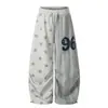 Marca 2026 Moda Estilo Japonés y Coreano Tendencia Pantalones Casuales Estampados Pantalones Curvos Bloque de Color Suministro al Por Mayor 04
