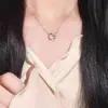 Colar Anel de Mobius Não Desbota em Aço Titânio Ins Elegante Nicho Luxo Acessível Design de Ponta Corrente para Clavícula Versátil