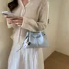 Moda internacional 2026 primavera nova bolsa de mão casual personalizada simples bolsa balde bolsa de ombro transversal moderna