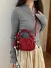 Exquisito bolso retro de gamuza de nicho para mujer, nuevo modelo 2026, bolso cruzado casual versátil, bolso de mano pequeño súper popular
