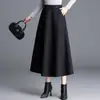 Nova saia feminina simples de cor sólida elegante 2026 outono cintura alta modeladora barra larga que cobre o quadril saia longa evasê moderna