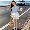Conjunto de Dos Piezas de Moda Coreana Verano 2026: Camiseta de Manga Corta con Cordón y Falda Dulce Fresca Linda de Pastel