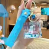 Llavero de pez dorado pequeño flotante para hombres y mujeres, exquisito, lindo, colgante de llavero de coche de botella flotante, colgante de bolso, pequeño regalo