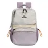 Mochila feminina de grande capacidade estilo japonês e coreano, mochila de viagem color-blocking estilo ins, bolsa casual nicho para estudantes de campus