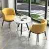 Mesa y silla de balcón de lujo ligero juego de tres piezas Celebridad de Internet una mesa y dos sillas creativa ocio simple recepción conjunto de mesa redonda combinación