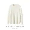 Novo estilo de suéter de cashmere grosso, canelado, com mangas raglan, caimento solto e relaxado, gola redonda, apresentando padrão trançado.