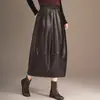 Saia de couro preta para mulheres, novo modelo outono 2026, comprimento médio, cintura alta, justa ao corpo, casual e fashion, faz você parecer mais alta e magra