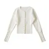 Tejido de punto de estilo europeo y americano de cintura alta de un solo pecho 2025 Otoño Nuevo Sexy Delgado Diseño Cuello Redondo Manga Larga Chaqueta