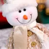 Adornos de Muñeco Navideño Sentado Transfronterizo Decoraciones Navideñas de Regalo Champagne Dorado Anciano Muñeco de Nieve Reno