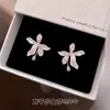 Brincos de Flor de Lírio com Brilho de Diamante, Frescos e Elegantes, para Mulheres, Novo Modelo Popular de 2026, Acessórios de Orelha Exclusivos e Requintados para Nicho
