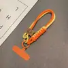 Estilo Británico Color de Contraste Tejido Cordón para Teléfono Móvil Bolso Corto de Moda Ins Funda para Teléfono Móvil Cuerda para la Muñeca Colgante de Bolso Muñeca