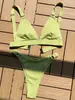 Nuevo bikini de hoyos pequeño europeo y americano color liso círculo pequeño traje de baño AliExpress bolsa triangular transfronteriza traje de baño