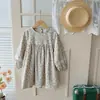 Ropa Infantil Estilo Coreano Cuello Redondo Manga Abullonada Encaje Vestido de Niña Colección Primavera 2026 Floral Holgado Manga Larga Falda Infantil