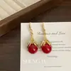 Venta caliente transfronteriza Europa y América pendientes de liquidación full diamond industria pesada sensación de alta gama temperamento único pendientes de botón para mujer joyería para orejas venta al por mayor