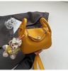 2025 Primavera Nuevo Diseño Nicho Retro Bolso de Mano al Hombro Bolso de Mujer Moda Más Fácil de Combinar Para Desplazamiento Bolso Bandolera