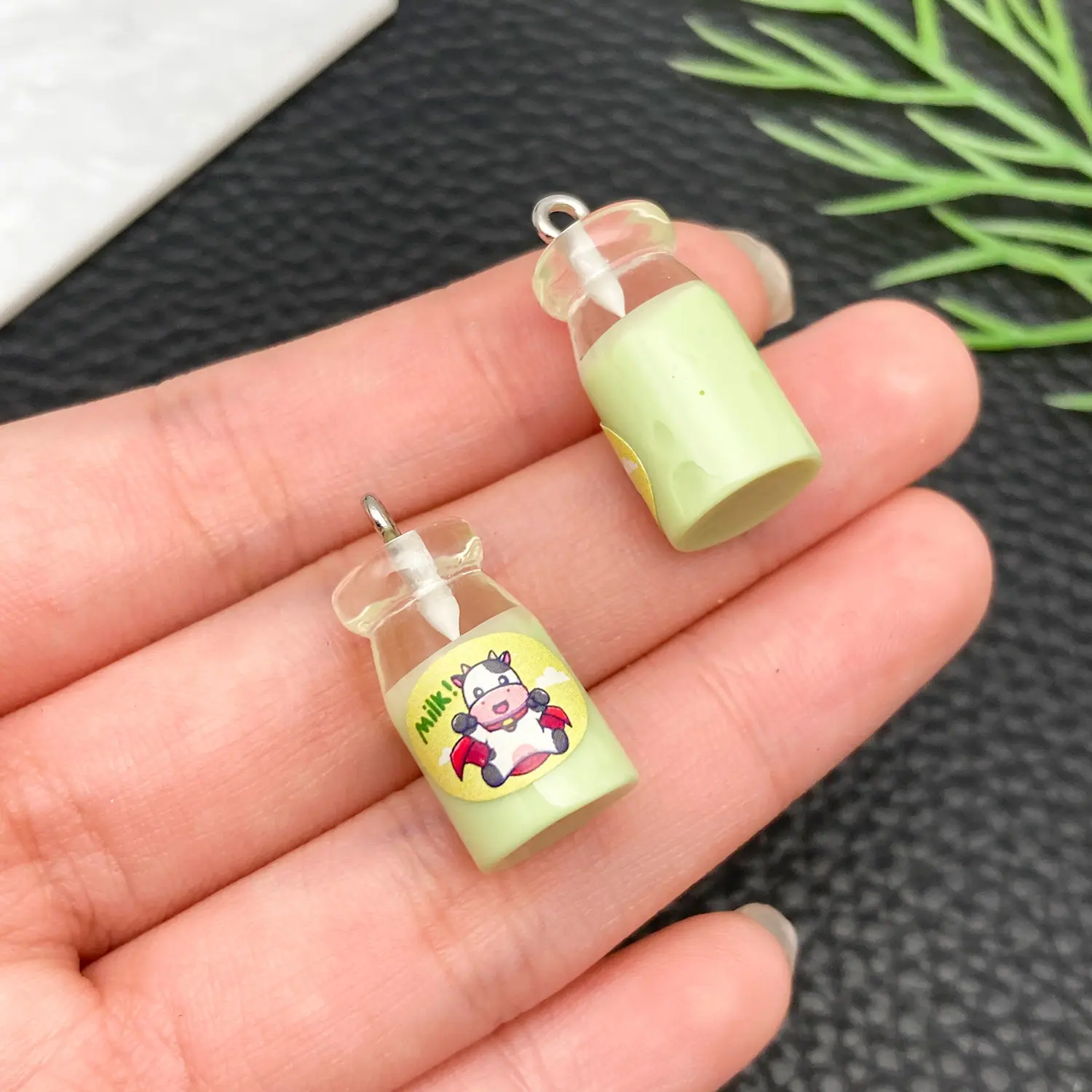 24096-JD3-透明绿色牛奶奶瓶24x11x11mm-1