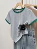 Camiseta de algodón de manga corta con hombros descubiertos para mujer, diseño irregular y elegante, top corto con contraste de color.