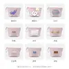 Bolsa de maquillaje minimalista brillante de exportación transfronteriza, ligera y fácil de llevar para viajar, neceser impermeable, bolso de mano de gran capacidad
