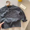 Ropa nueva para niños: Camiseta de manga larga con botones, camisa Polo para niño, moda de otoño para bebé, con bolsillo, versátil, camiseta básica