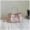 Bolso Cubo Retro Casual Transfronterizo para Mujer 2026 Modelo Nuevo Gran Capacidad Simple Hombro Viajero Axila Cruzado