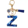 Venta Caliente Transfronteriza Azul Real Moderno Llavero con Letras Inglesas Ojo del Diablo Borla Colgante de Bolso Joyería Regalo