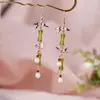 Nuevos Pendientes de Estilo Antiguo Chino Pendientes Largos con Borla de Bambú Pendientes de Clip para Oreja con Forma de Abanico Diseño de Nicho Pendientes Asimétricos