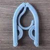 Multi-funcional Magic Travel Folding Clothes Hanger portátil retrátil Travel Travel Home Clothes Hanger Pequeno Suporte