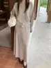 Conjunto informal de falda y suéter de punto para mujer, nuevo estilo coreano otoño e invierno 2026, conjunto de dos piezas de alta gama a la moda