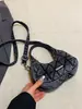 Bolsa Meia-Lua Jeans Acolchoada Única para Mulheres 2026 Nova Tendência Retro Bolsa de Ombro Transversal Bolsa de Mão Fashion Versátil