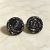 Brincos elegantes de fluxo reverso da antiguidade média Série preta retrô de alta qualidade Brincos de pérola outono e inverno Novos brincos de nicho franceses