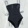 Traje de baño de una pieza para mujer, retro europeo y americano de lunares, tirantes finos sexy con cordón, diseño ajustado, sentido del diseño, para vacaciones en la playa, 2027