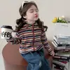 Nuevos jeans rectos rasgados de otoño para niños 2026 Versión coreana ropa infantil para niñas pantalones anchos de escuela venta al por mayor