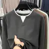 Nueva camiseta informal de moda para hombre de otoño e invierno, cuello redondo, sudadera de manga larga engrosada, cálida y suave, adecuada como capa interior, chaqueta moderna