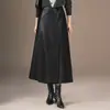 Falda de moda de cuero PU de cintura alta, nuevo modelo otoño 2026, elegante y versátil, con un toque de alta gama, adelgazante y que realza la altura