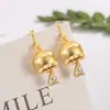 Nuevos Nuevos Pendientes Colgantes de Flor de Lirio del Valle Dorada Estilo Chino Gota de Agua Pendientes de Linterna Pequeña Diseño de Nicho Retro Zirconia